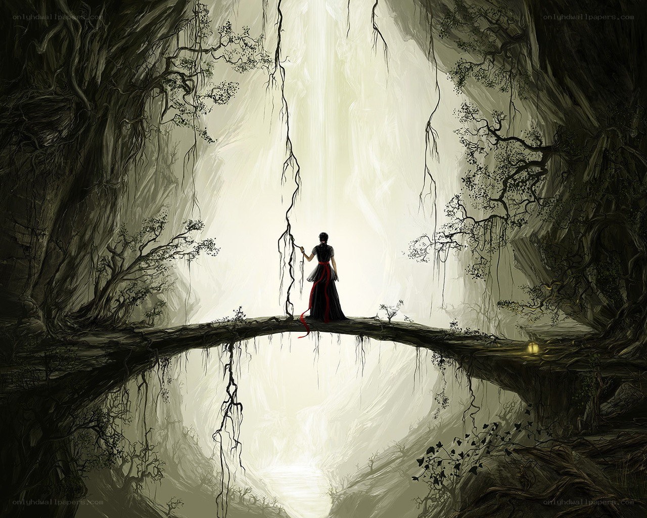 figure on a bridge in a cave