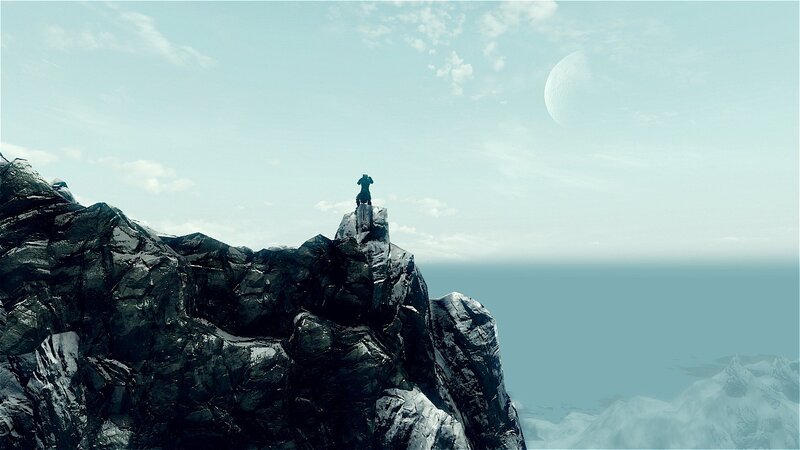 figure on a rocky cliff