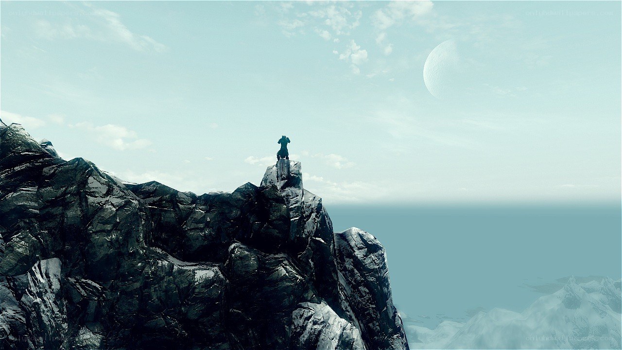figure on a rocky cliff