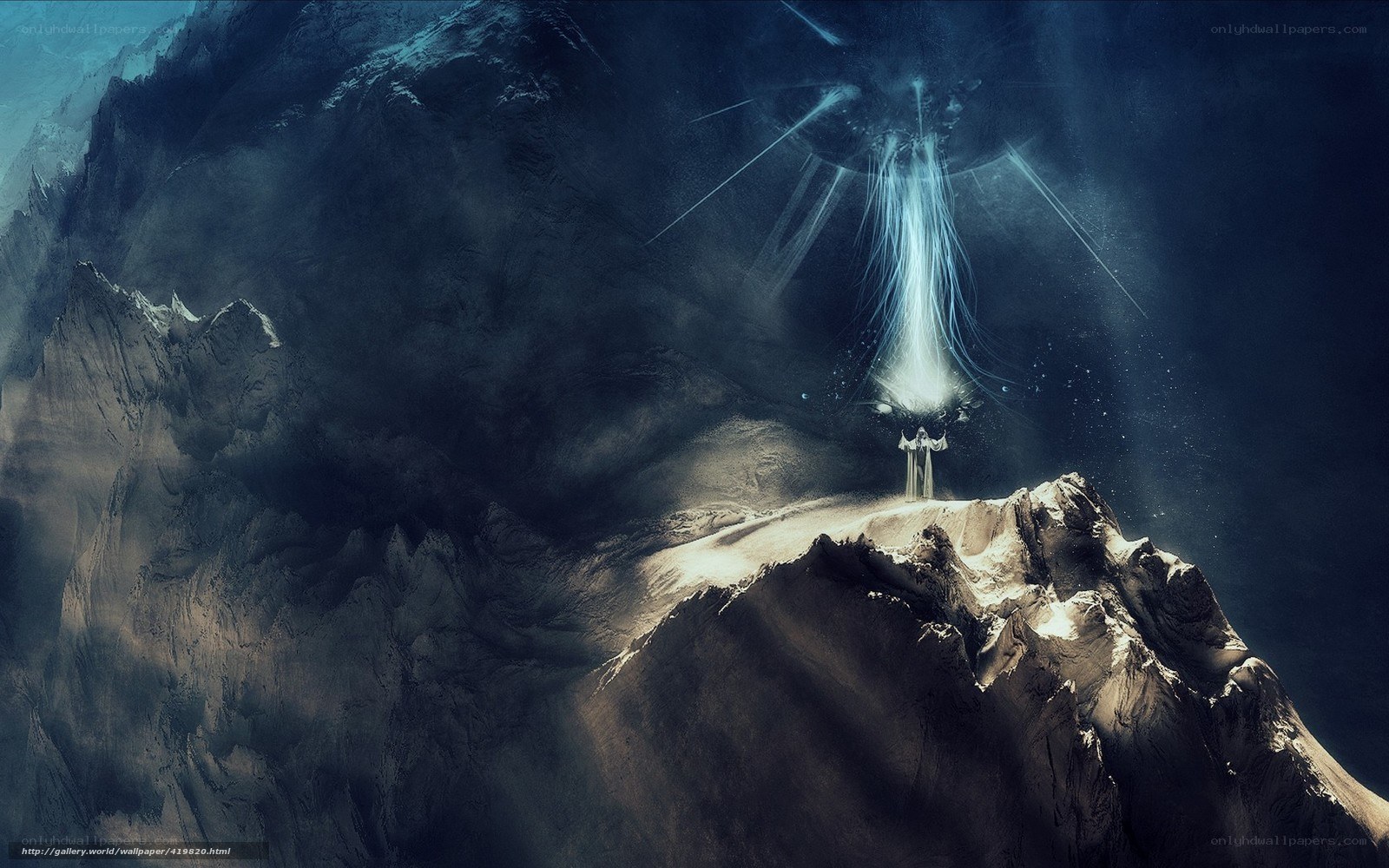 figure on mountain peak