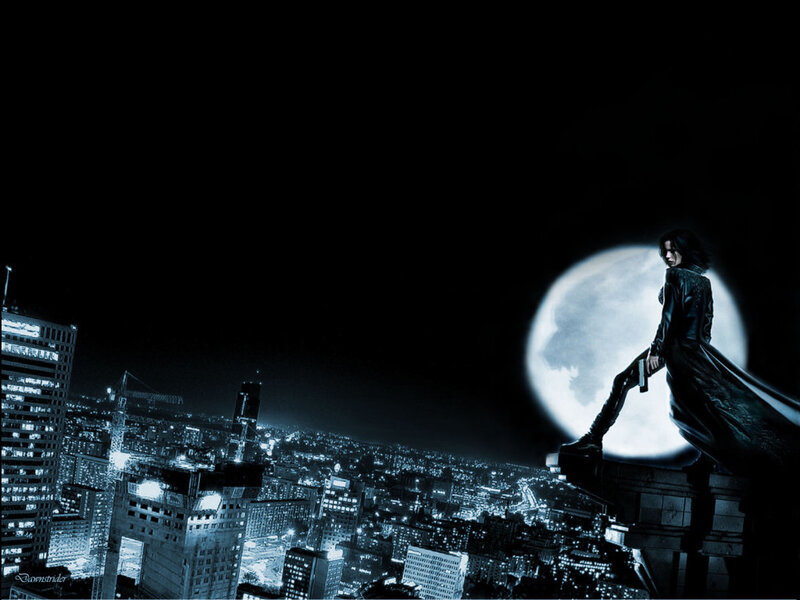 figure on rooftop at night