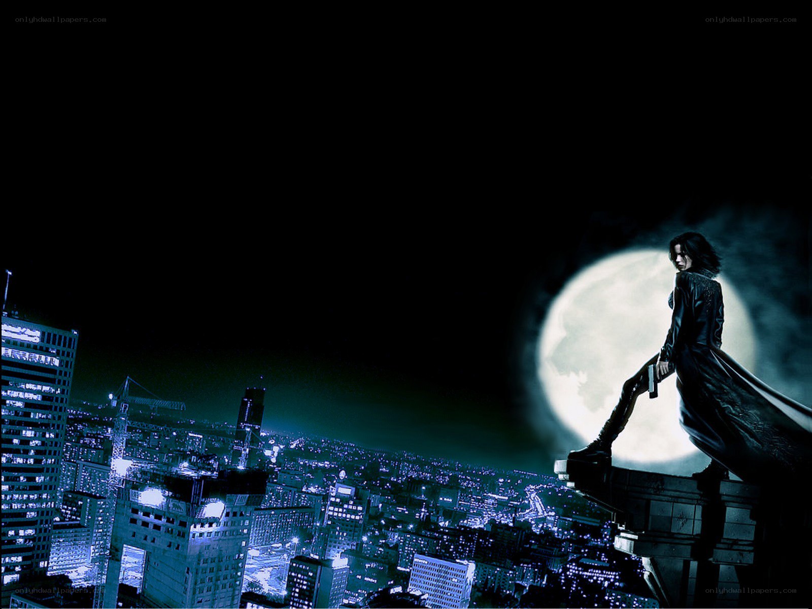 figure on rooftop at night