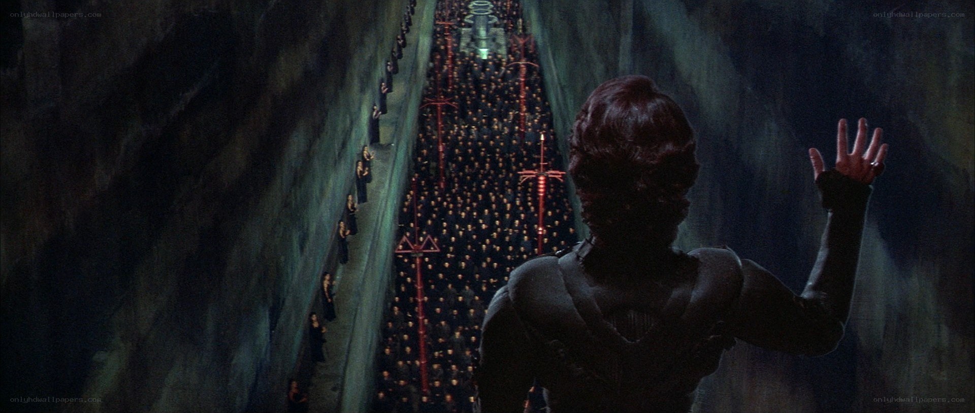figure overlooking a crowd