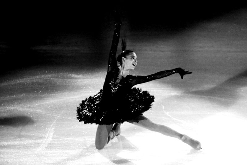 Figure Skater in Black Costume — Dramatic