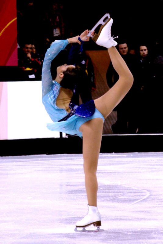 figure skater in blue costume