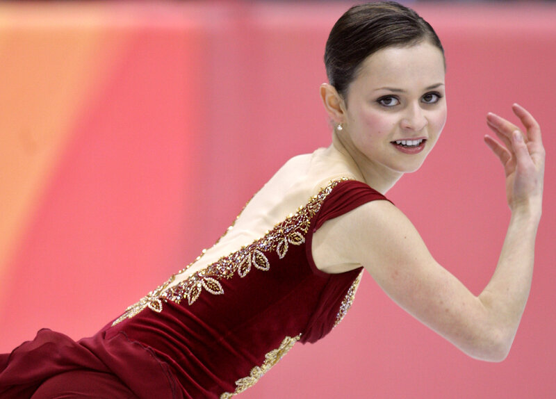 figure skater in red costume