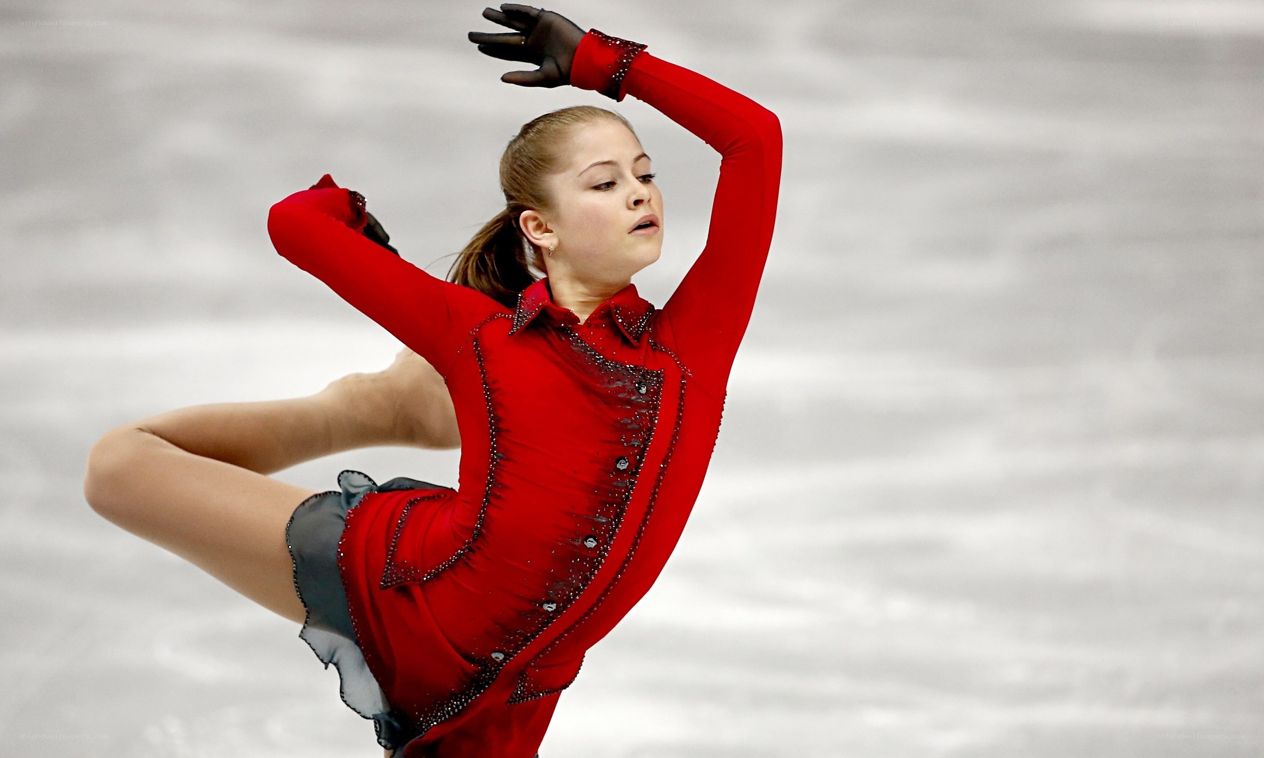 figure skater in red costume
