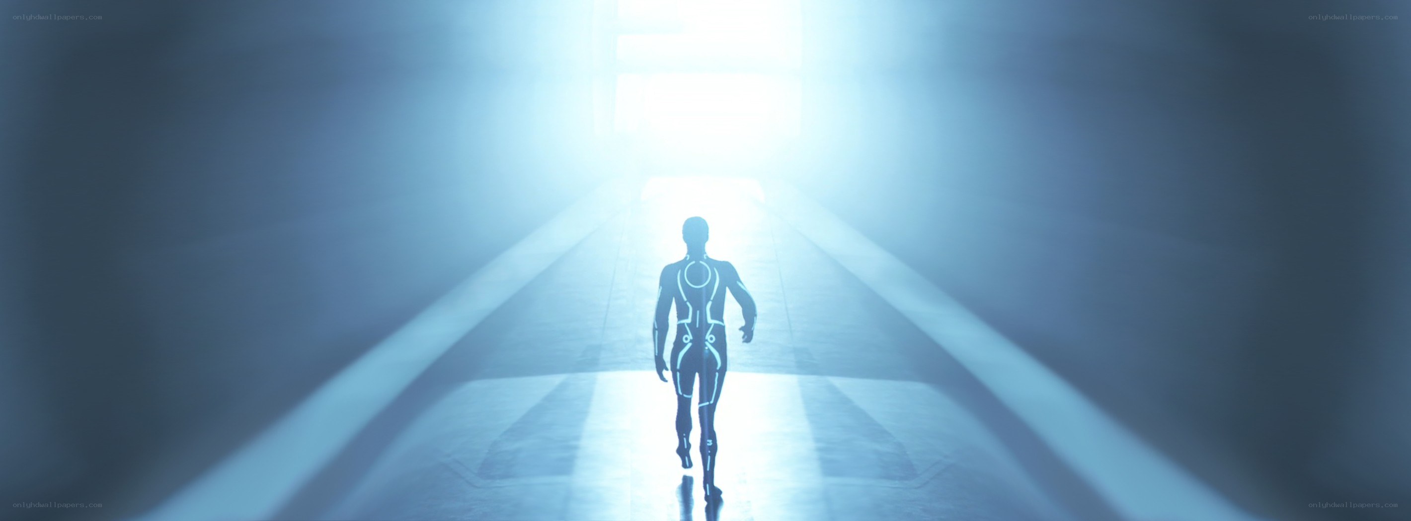 figure walking toward light