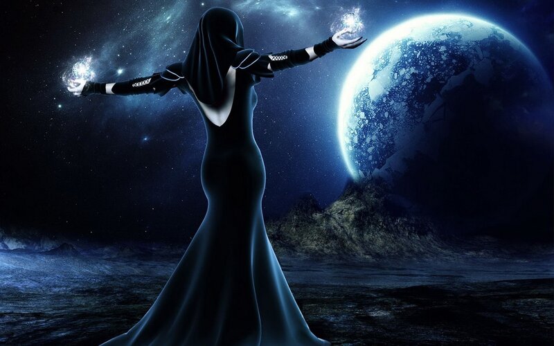 figure with glowing orbs