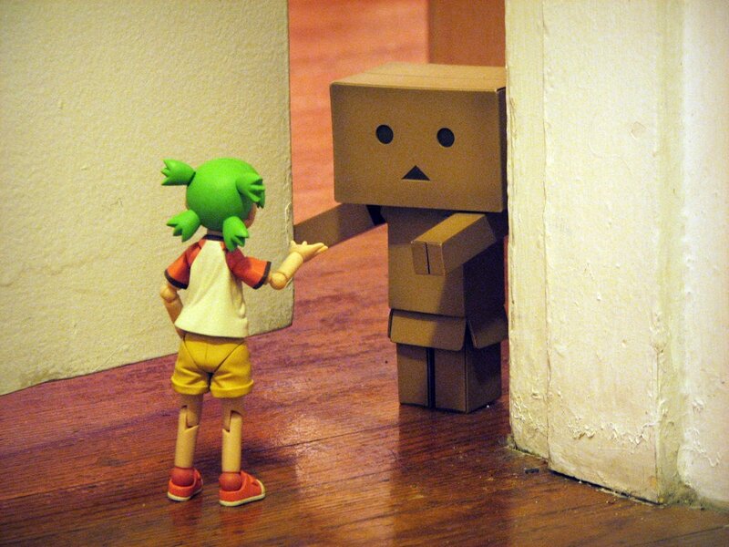 figurine and cardboard robot