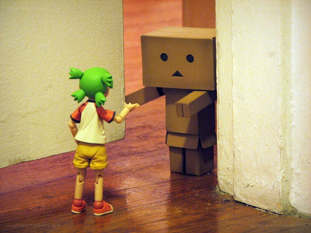 figurine and cardboard robot
