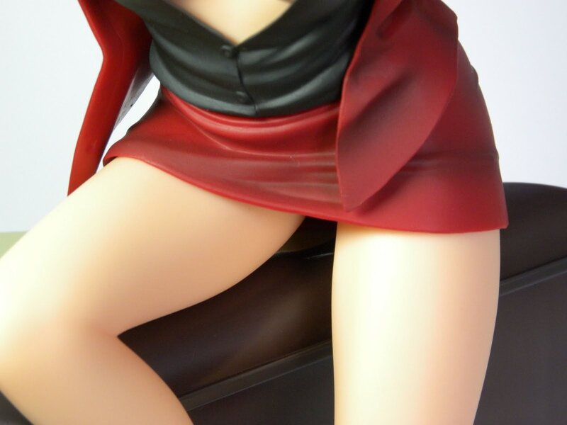 figurine in red skirt