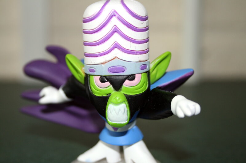 figurine of a green alien character