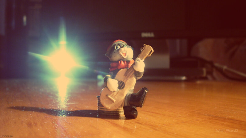 Figurine of Cat Playing Guitar