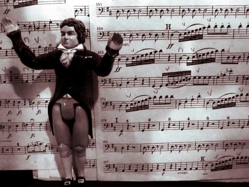 Figurine on Sheet Music