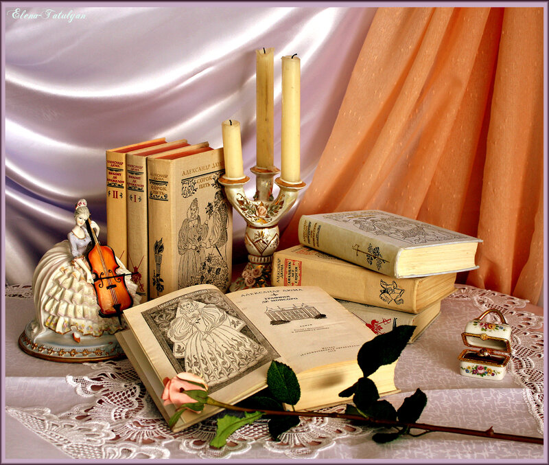 Figurine with Books and Candles