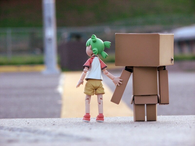 figurine with cardboard robot