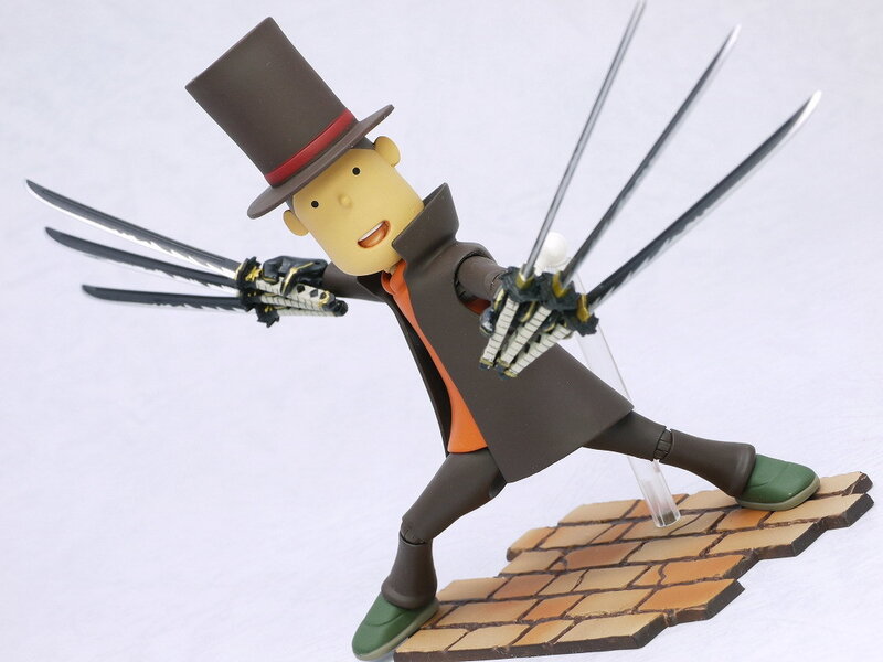 figurine with sword claws