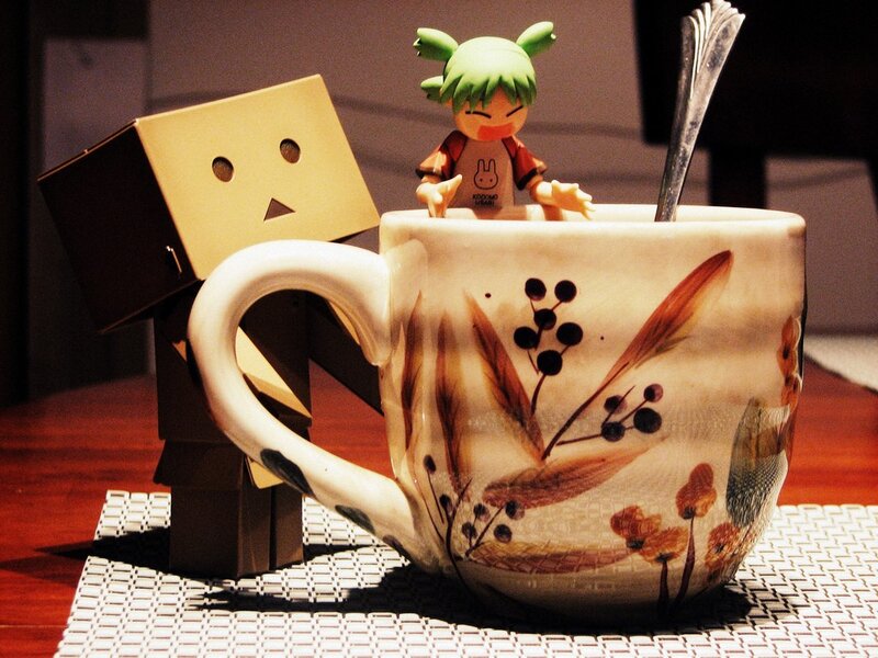 Figurines in a cup