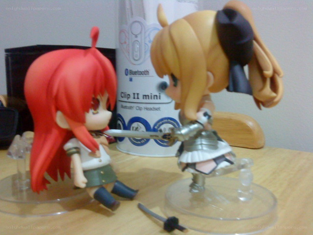 figurines in a duel