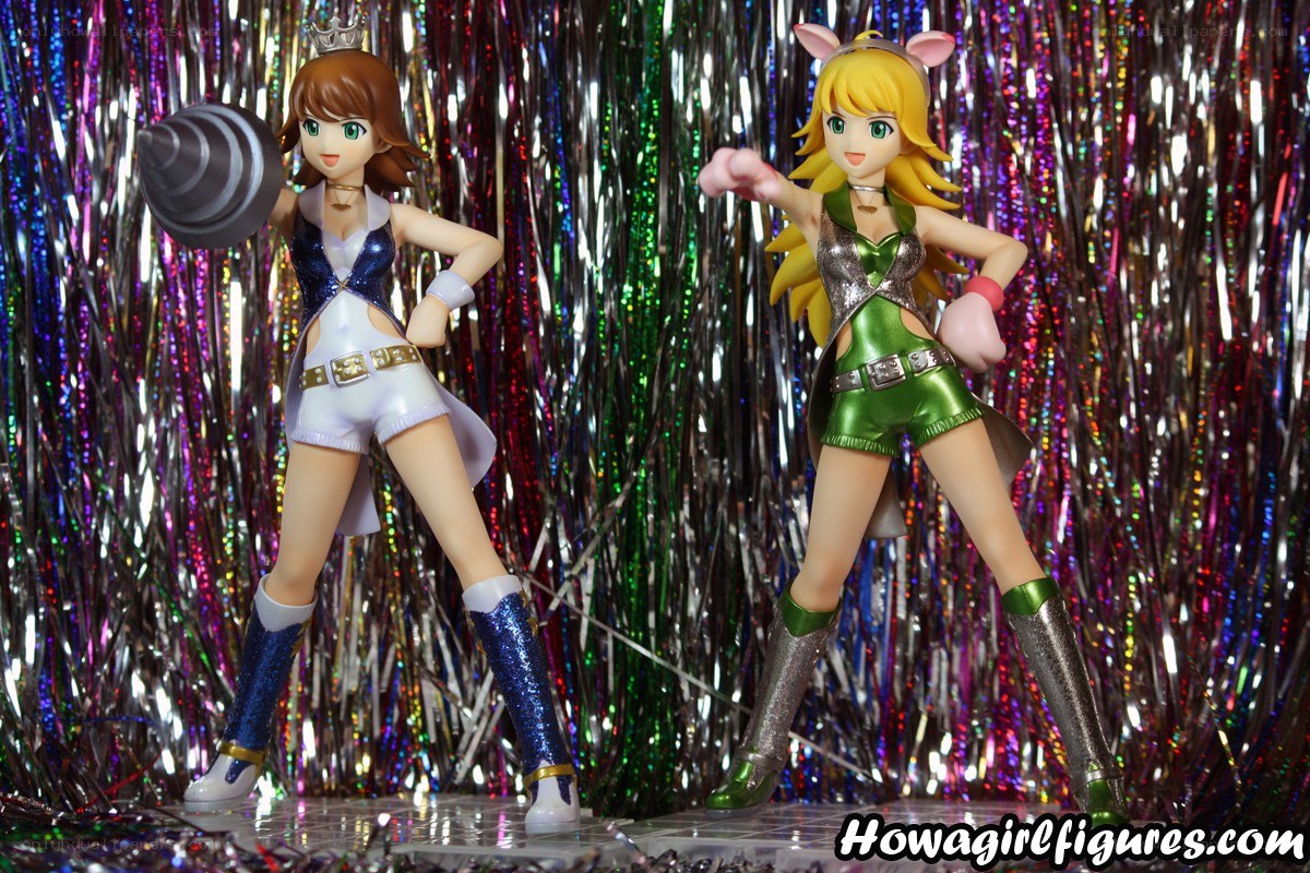 figurines in shiny outfits