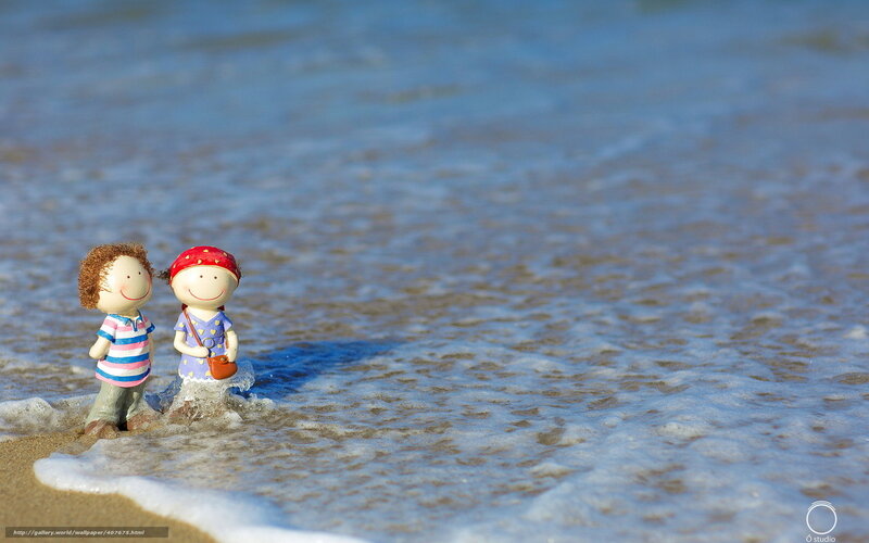 Figurines on the beach