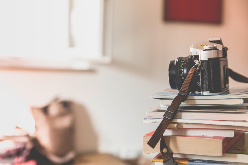 Film Camera on Books
