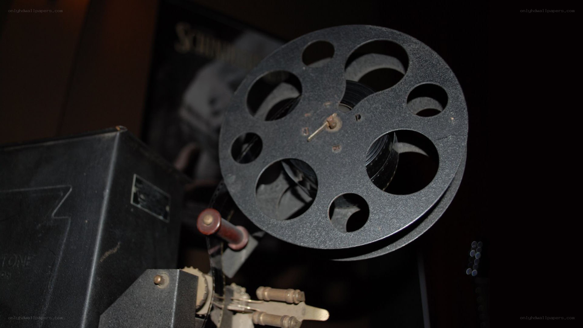 Film projector with reel