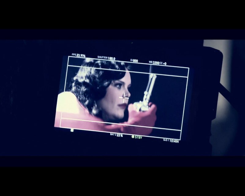 film set monitor showing actress