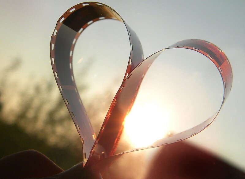 Film strip heart at sunset