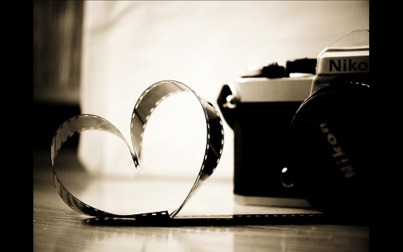 Film strip heart with camera