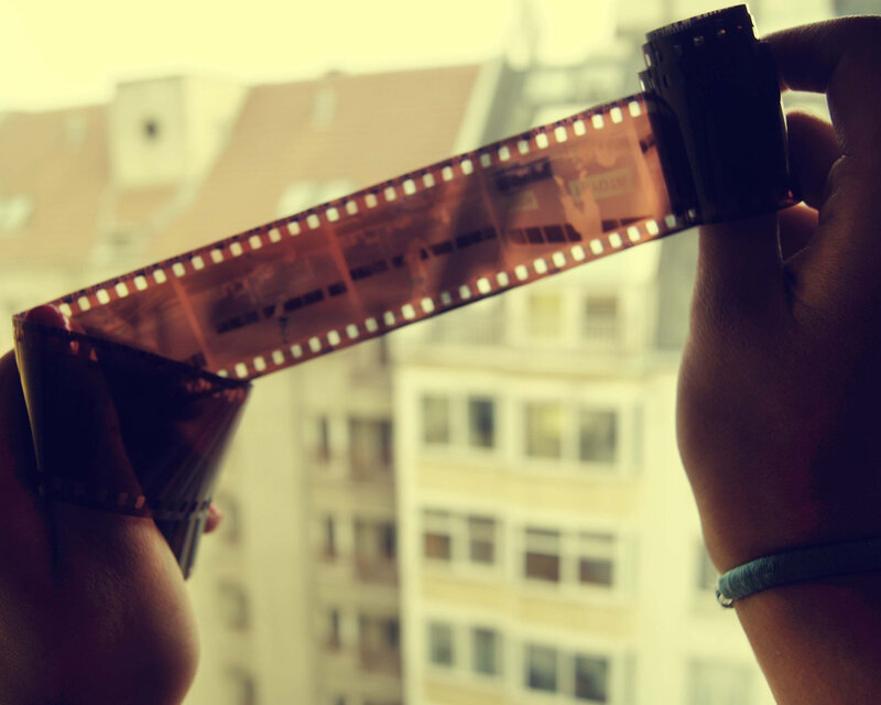 Film strip held up to window