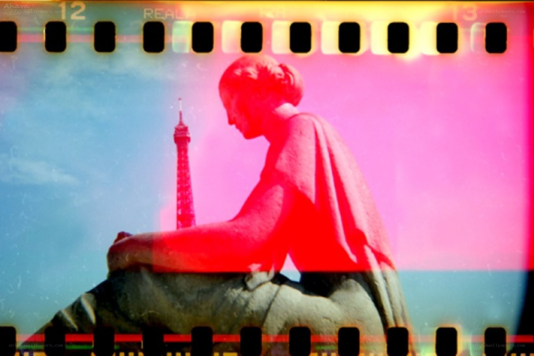 Film strip with statue and Eiffel Tower