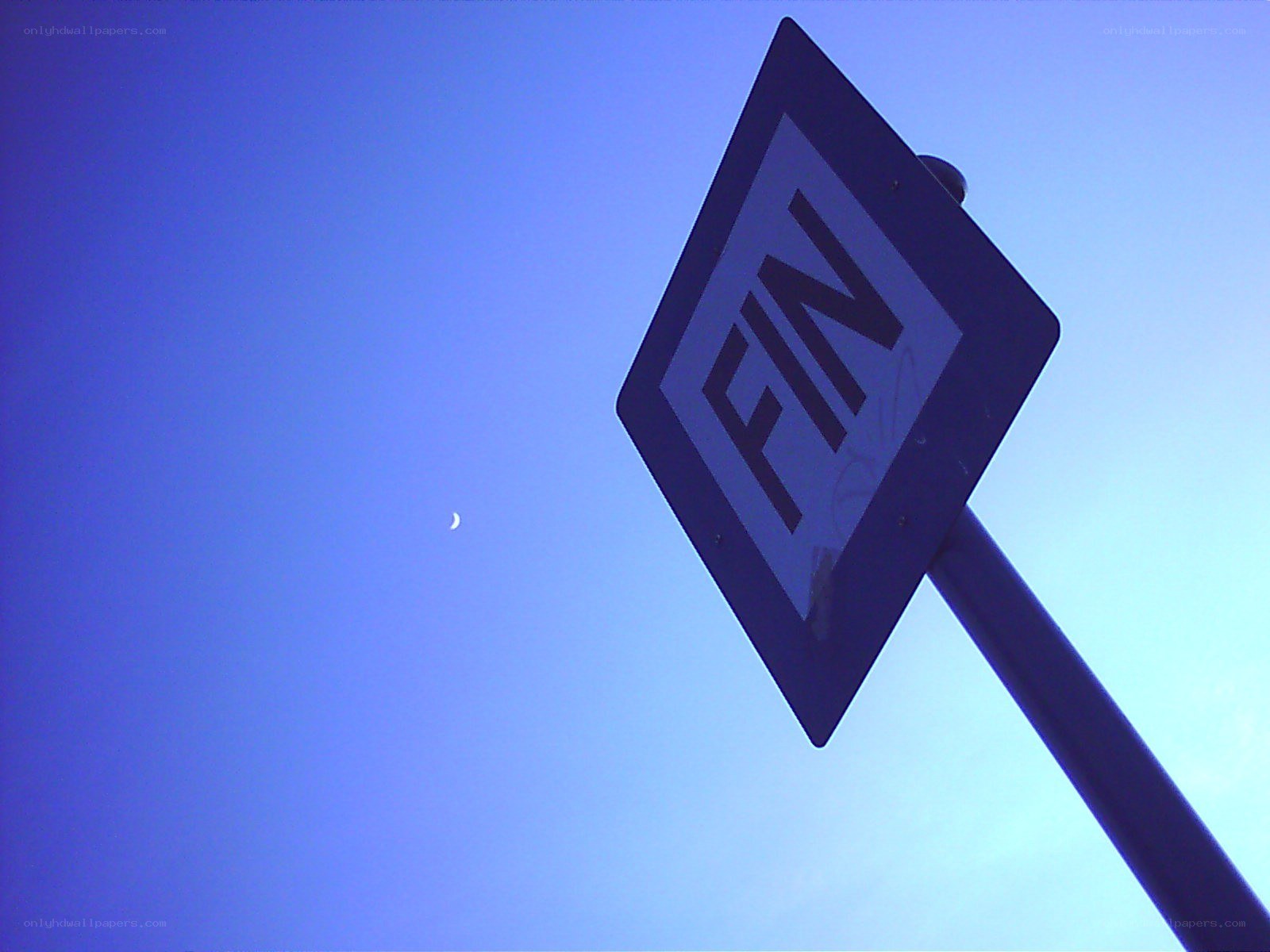 FIN sign against blue sky