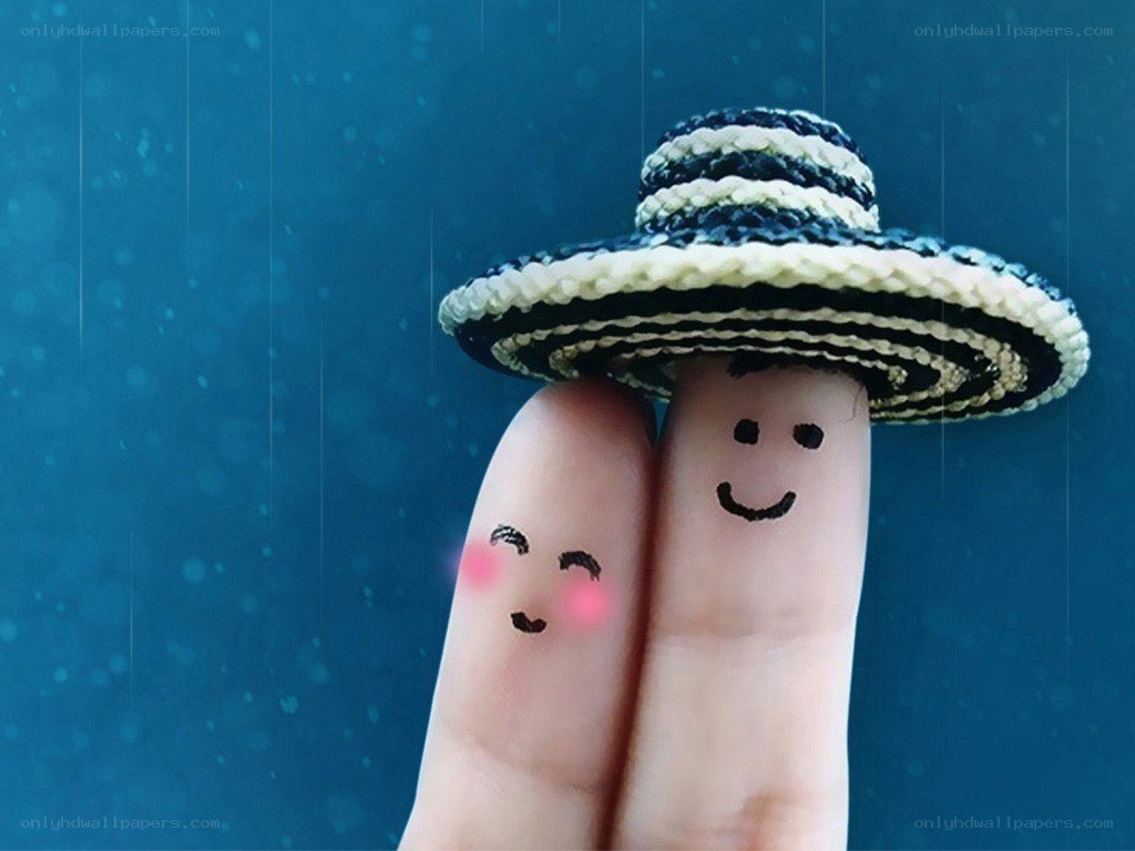 Finger art couple under hat