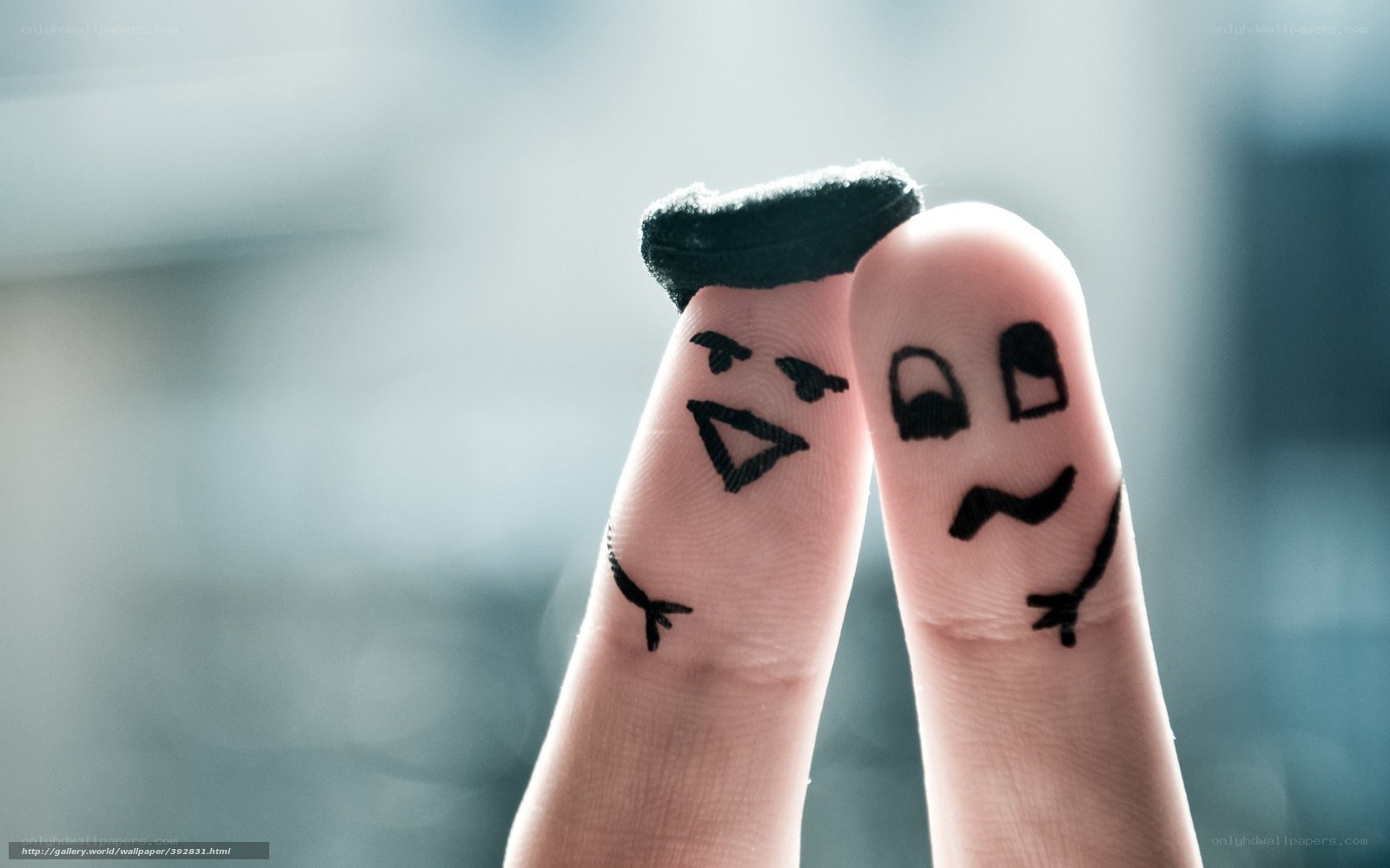 Finger art with drawn faces