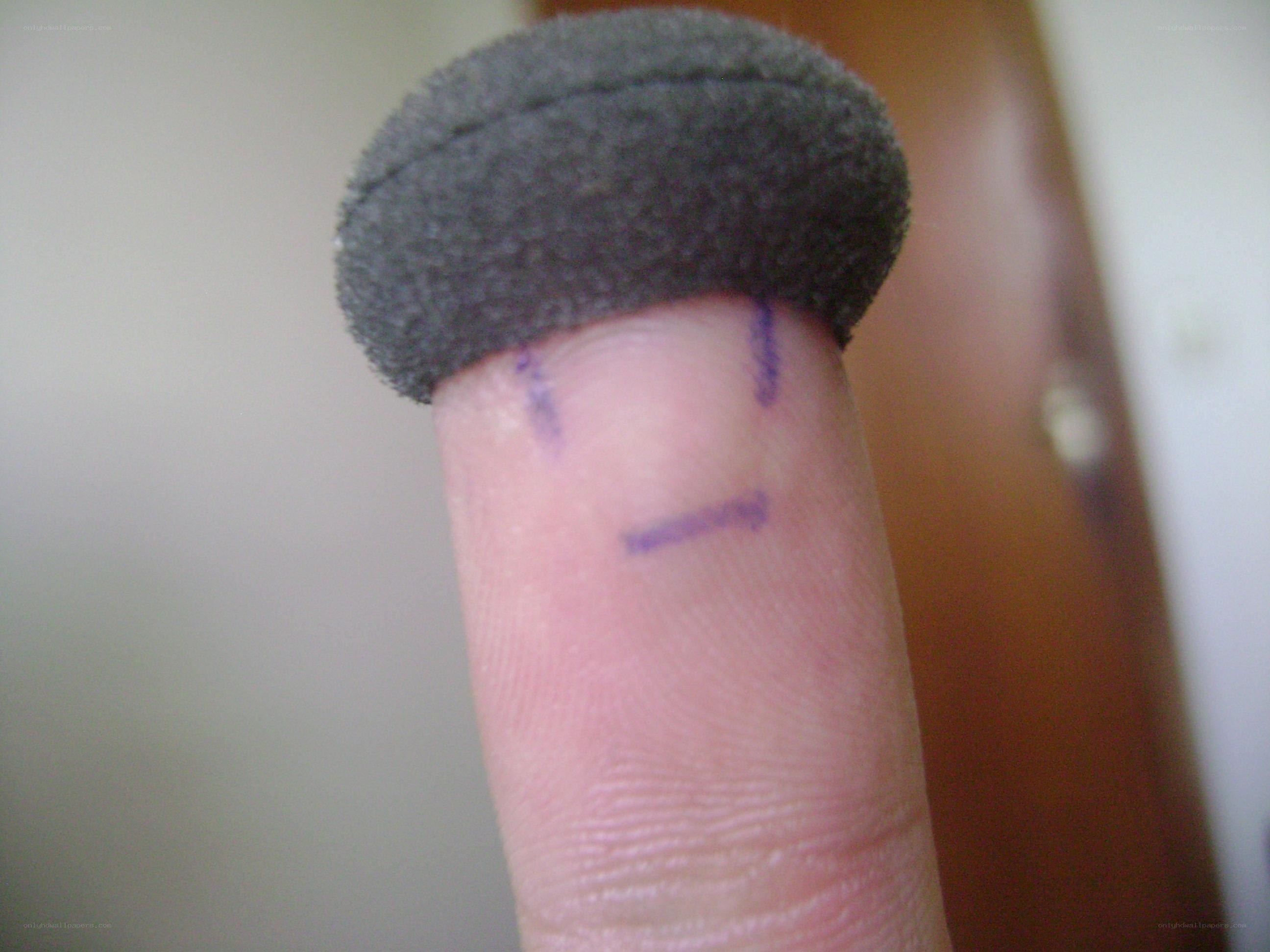 finger with foam cover and drawing