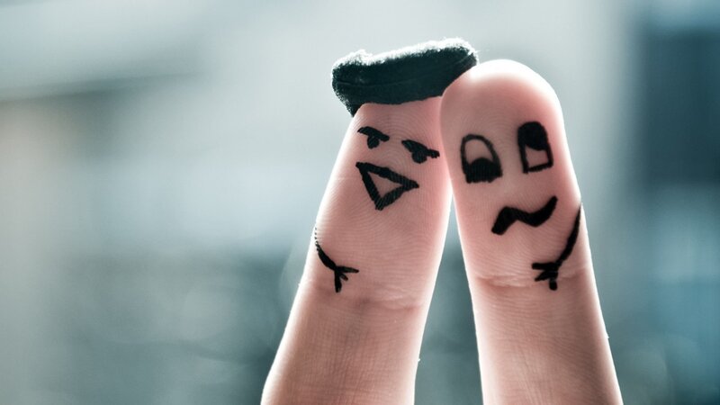 Fingers with Drawn Faces — White, Playful