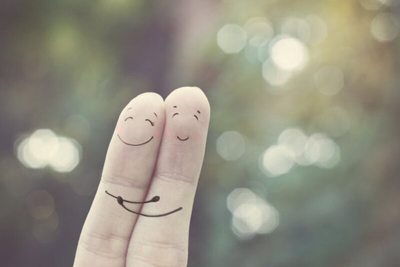 Fingers with Drawn Faces — White, Serene