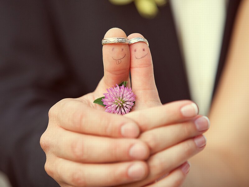 Fingers with Rings and Flower — Pink
