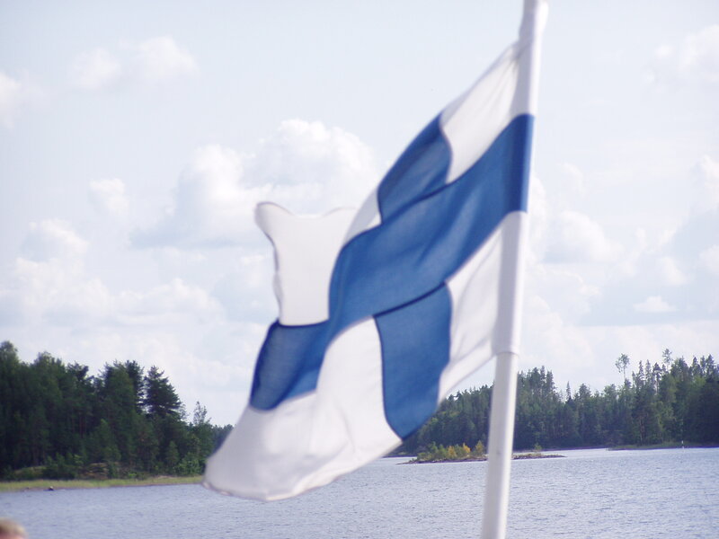 Finnish flag on a lake
