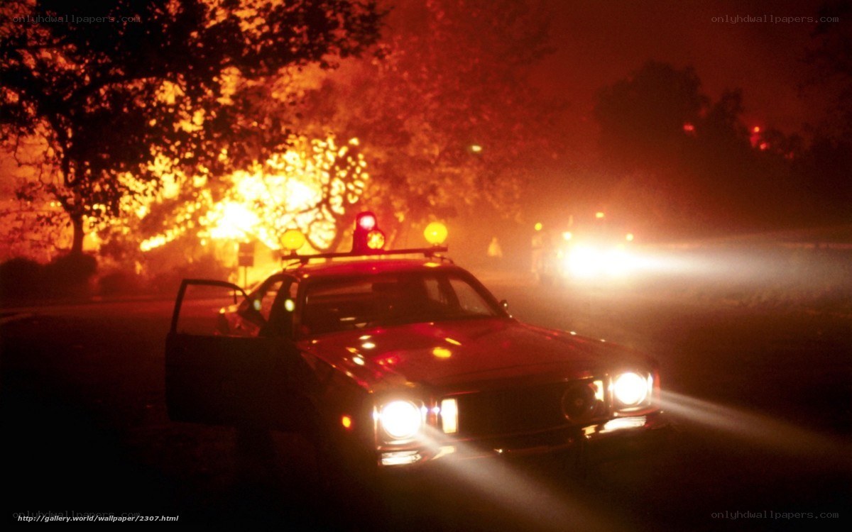 Fire at night with emergency vehicle