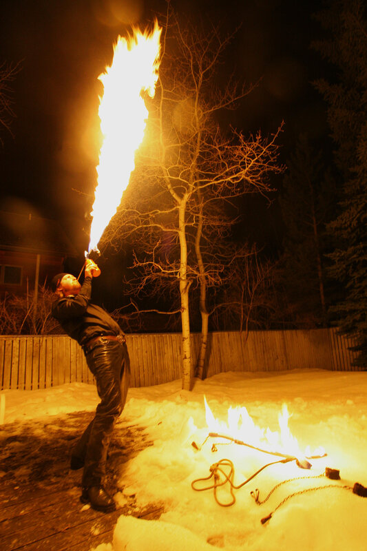 Fire breather in snowy yard