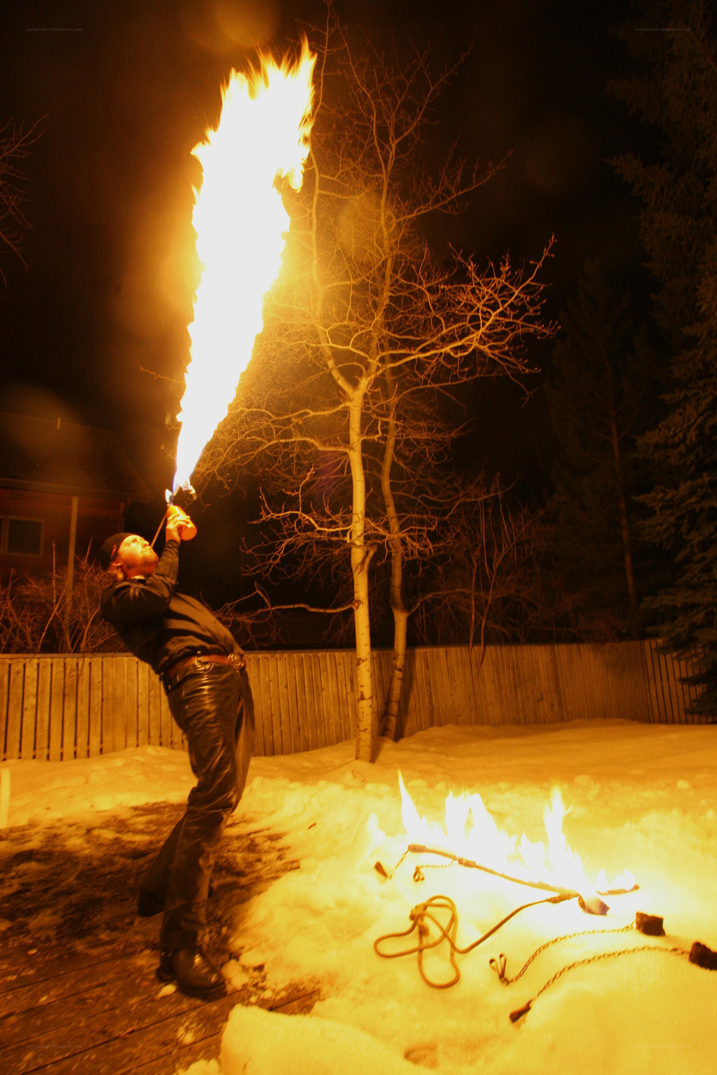 Fire breather in snowy yard