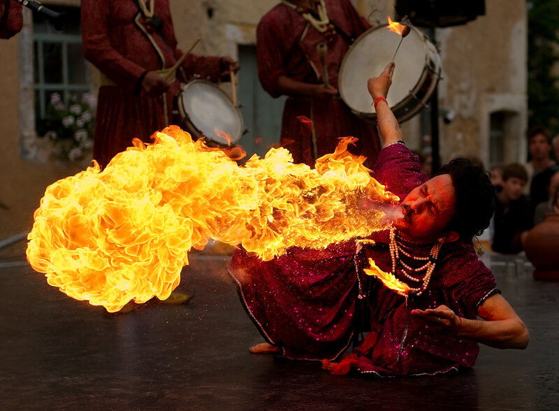 Fire-breathing performer at festival