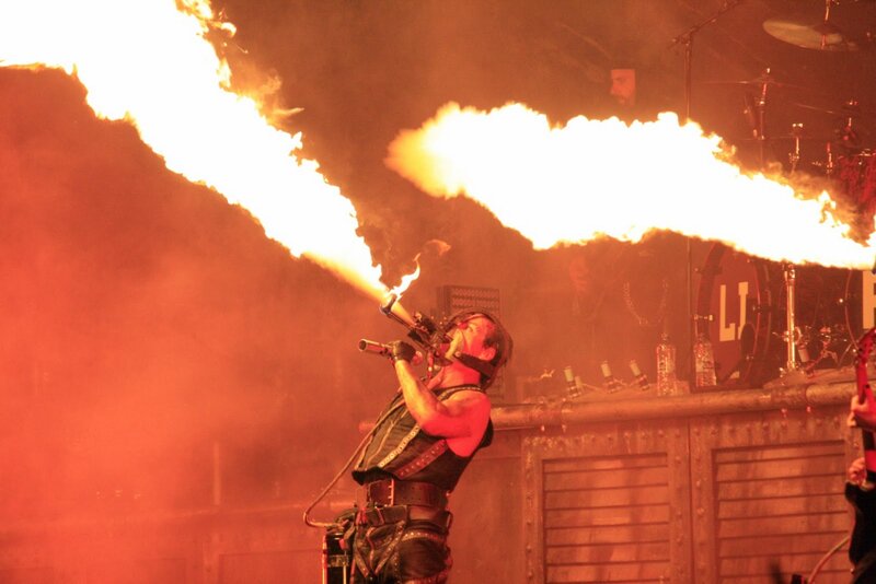Fire-breathing performer on stage