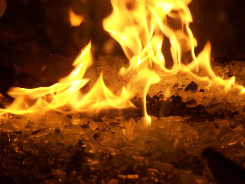 Fire burning on glass shards