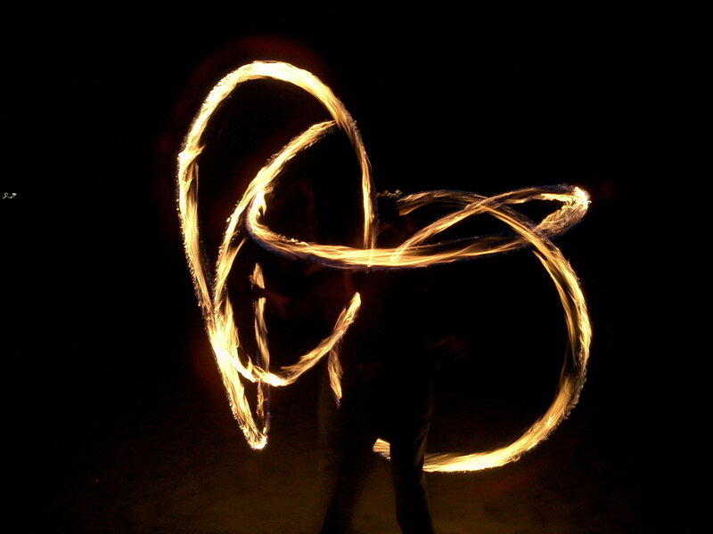 Fire dancer at night