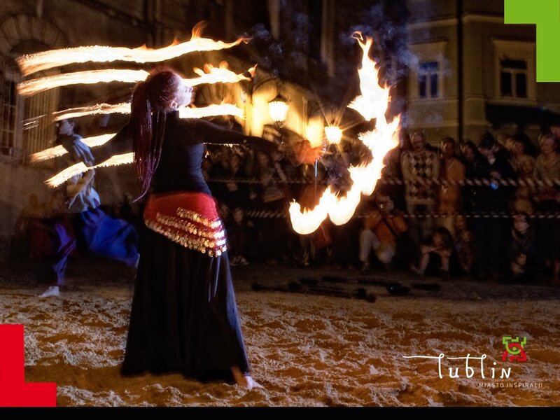 Fire dancer at night performance