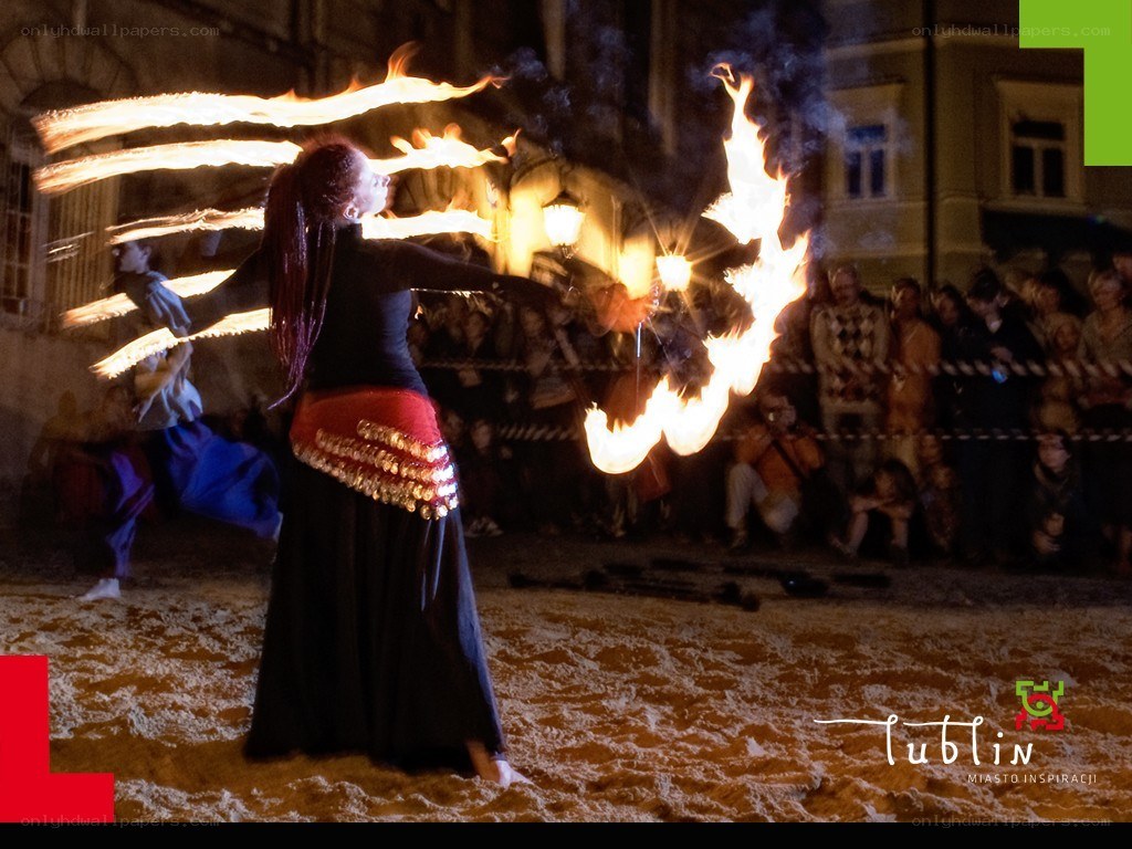 Fire dancer at night performance
